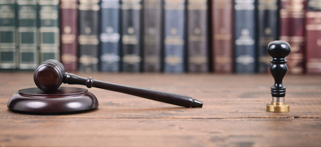 Law and Justice, Legality concept, Judge Gavel and Notary seal on a wooden background, Law library...
