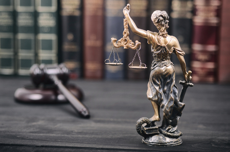 Law and Justice, Scales of Justice, Justitia, Lady Justice, law library concept, Law books in the background.の写真素材