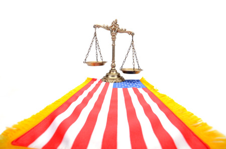 Scales of justice and flag of United States of America