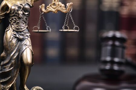 Law and Justice , Legality concept, Judge Gavel and Lady Justice on a black wooden background.