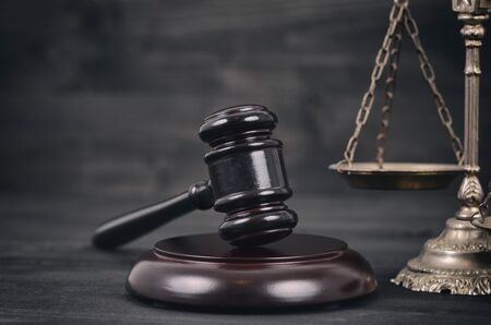 Law and Justice, Legality concept, Judge Gavel, Scales of Justice and Lady Justice on a black wooden...