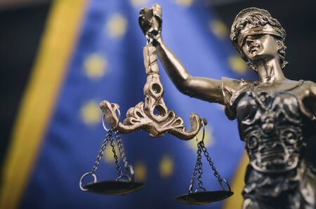 Law and Justice, Legality concept, Scales of Justice, Justitia, Lady Justice in front of the European Union flag in the background.の写真素材