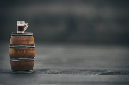 Wooden barrel and beer mug, beer industry concept.