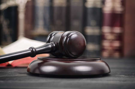 Law and Justice , Legality concept, Judge Gavel, Law book and Scales of Justice on a black wooden background, law library concept.の写真素材