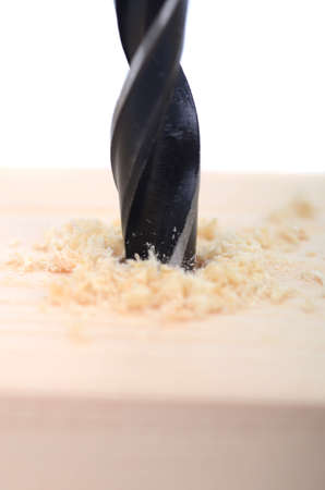 Drilling hole in wood, woodworking concept , drilling part of carpenter work.の写真素材