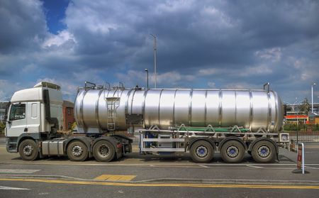 Articulated liquid container and truck の写真素材