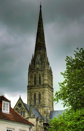 Spire of Salisbury Cathedral on an overcast dayの写真素材