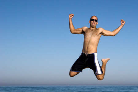 Man jumping on the beach
