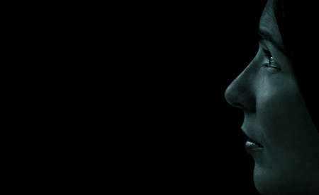 woman profile in a blue toneの写真素材