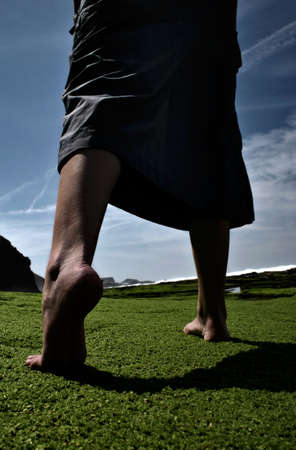 Woman walking at nightの写真素材