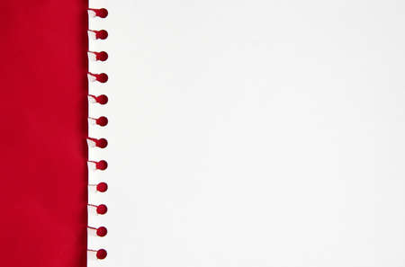 White paper in a red backgroundの写真素材