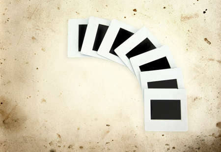 Aged paper background with a diapositive film seriesの写真素材