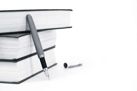 Composition with pen and booksの写真素材