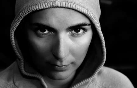 Woman portrait with a capの写真素材