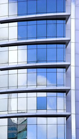 Picture of a Futuristic glass building with reflections 