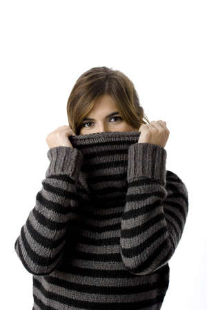 Beautiful woman portrait making a funny face - isolated on whiteの写真素材