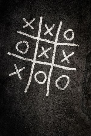 Noughts and Crosses game on pavingの写真素材