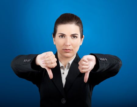 Portrait of a beautiful businesswoman with a negative lookの写真素材