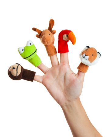 Female hand wearing 5 finger puppets; monkey, frog, reindeer, parrot; lion
の写真素材