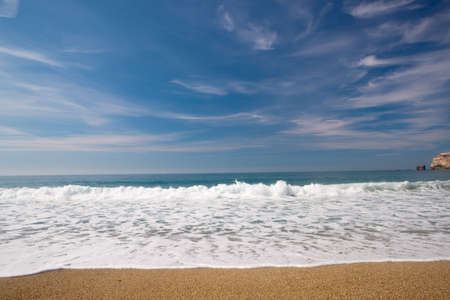 Landscape picture of the beautiful beach from Nazare, Portugalの写真素材