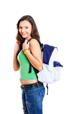 Beautiful young female student isolated on whiteの写真素材