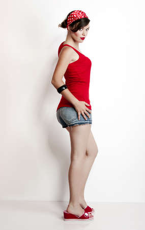 Beautiful and fashion young woman with a pin-up lookの写真素材
