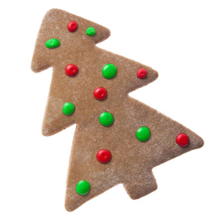 Homemade Gingerbread christmas cookies with a shape of a tree isolated on white