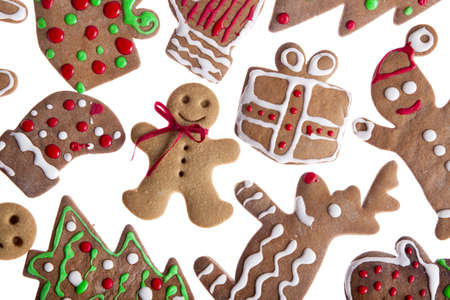 Homemade Gingerbread cookies with different shapes isolated on white background