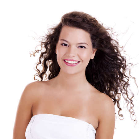 Beautiful and happy young woman isolated on white