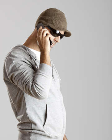 Young man making a phone call with a cellphone