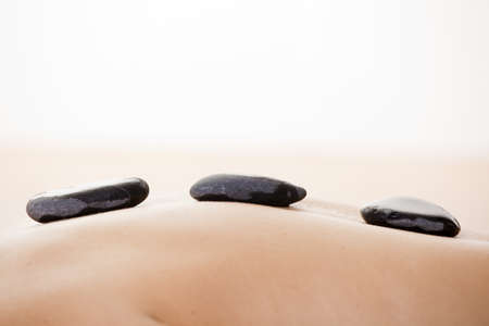 Close-up picture of a woman back getting a spa treatment の写真素材