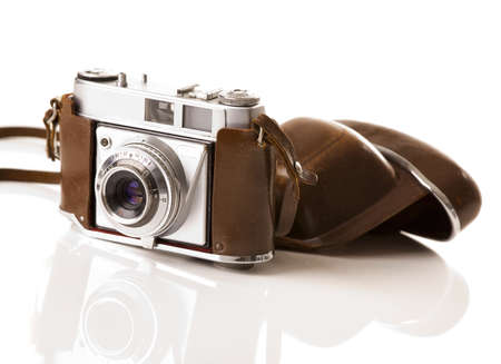 Old fashioned photography camera isolated over a white background