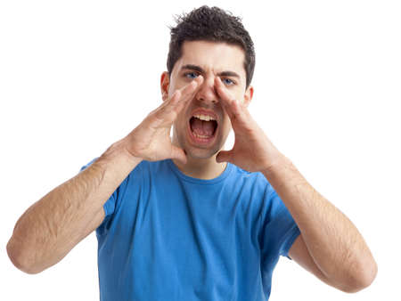 Portrait of a young man shouting loud with hands on the mouth, isolated on white background