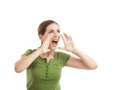 Portrait of a young woman yelling with hands on the mouth, isolated on white background