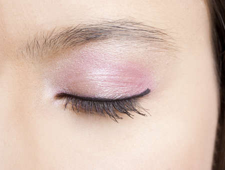 Close-up of a beautiful female eye with makeup