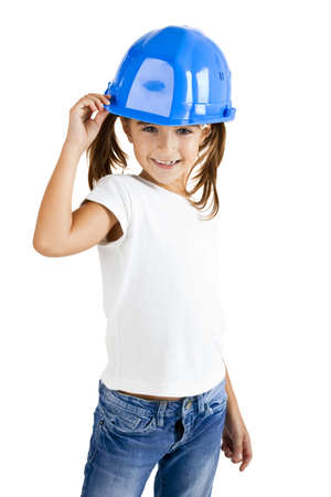 Little young girl wearing a protection helmet, isolated on white backgroundの写真素材
