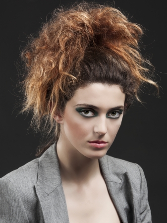 Studio portrait of a beautiful and fashion womanの写真素材