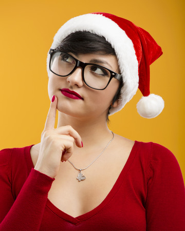 Beautiful and sexy girl wearing santa clause hatの写真素材