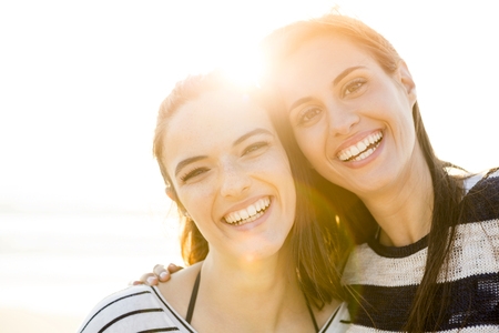 A portrait of best friends laughingの写真素材
