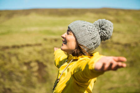 Woman contemplating a beautiful landscapeの写真素材