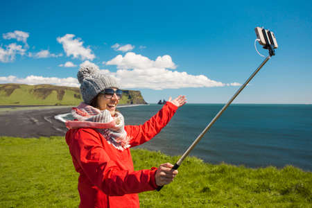Tourist having fun and making a selfieの写真素材