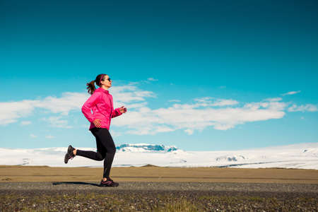 Woman running on a winter day