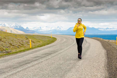 Woman running on a winter day