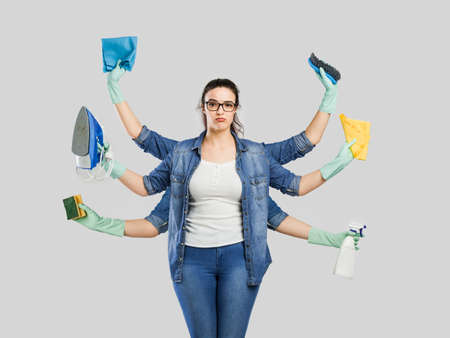 Creative concepts of a housewife with six armrの写真素材