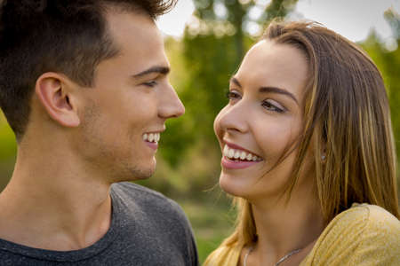 Portrait of a young beautiful couple smilingの写真素材