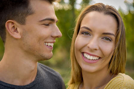 Portrait of a young beautiful couple smilingの写真素材