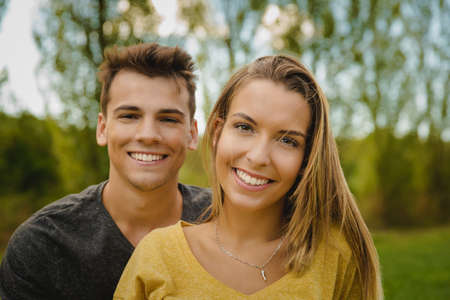 Portrait of a young beautiful couple smilingの写真素材