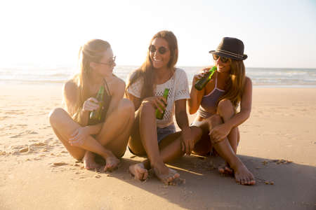 Best friends having fun on the beachの写真素材