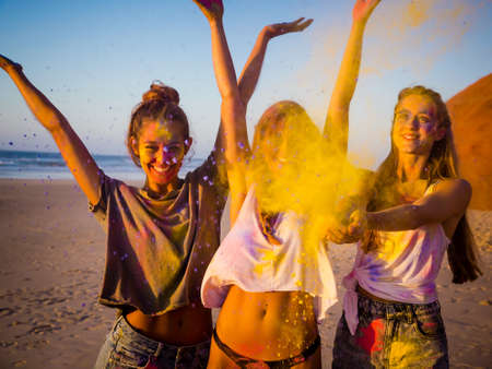 Best friends full of colored powder all over the bodyの写真素材