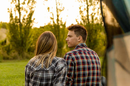 Shot of a happy couple camping on the nature